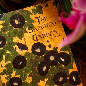 a copy of the book The Samurai's Garden by Gail Tsukiyama