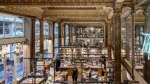 The stunning mirrored interior of Tropismes bookshop in Brussels, once a 19th-century ballroom.