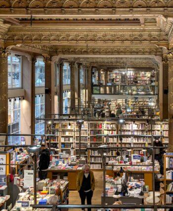 The stunning mirrored interior of Tropismes bookshop in Brussels, once a 19th-century ballroom.