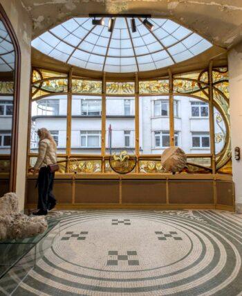 Interior view of Maison Hannon, capturing the light and 'slow living' atmosphere of 19th-century Brussels.