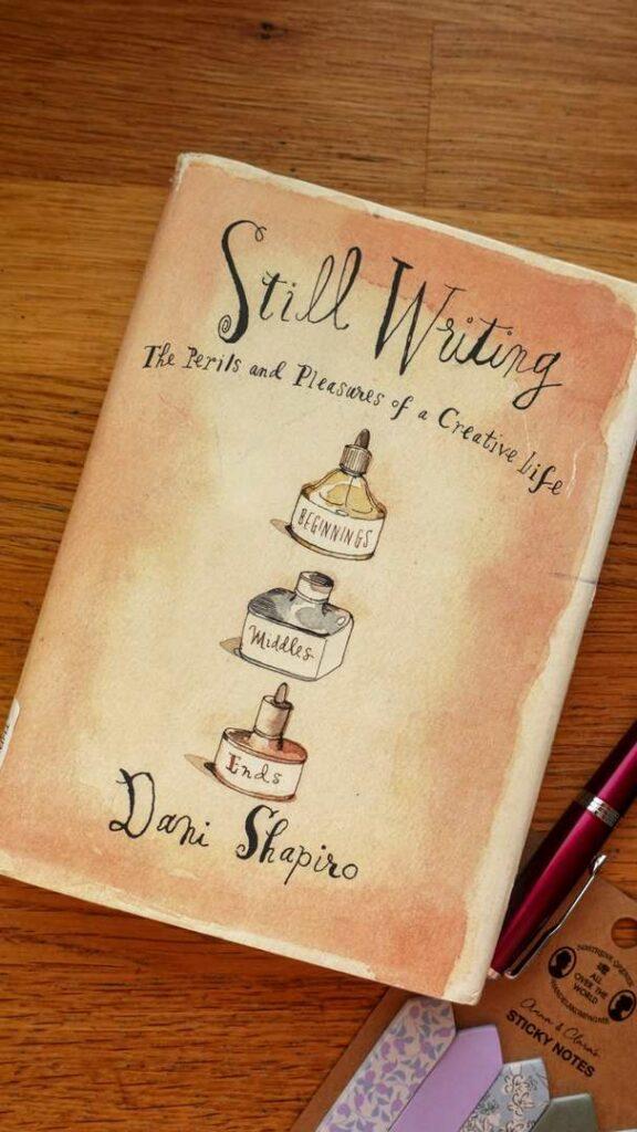 A close-up shot of the book cover for 'Still Writing: The Perils and Pleasures of a Creative Life' by Dani Shapiro.